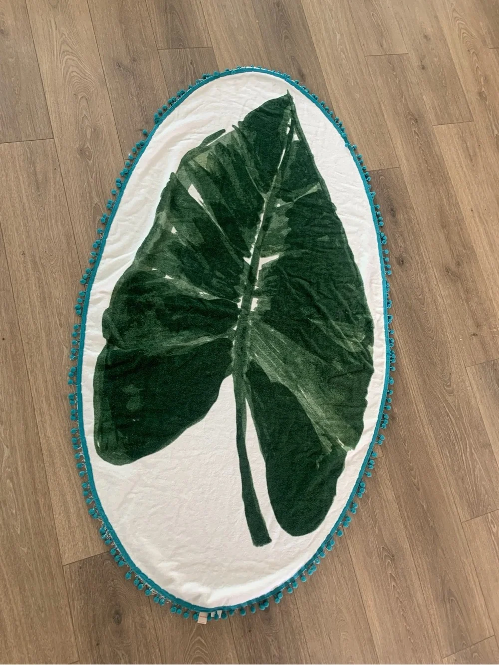 Botanical Tropical Green Leaf Oval Beach & Bath Towel with Teal Pom Pom Fringe